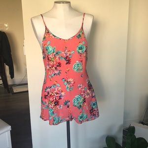 Minkpink romper size xs. Pinkish orange color